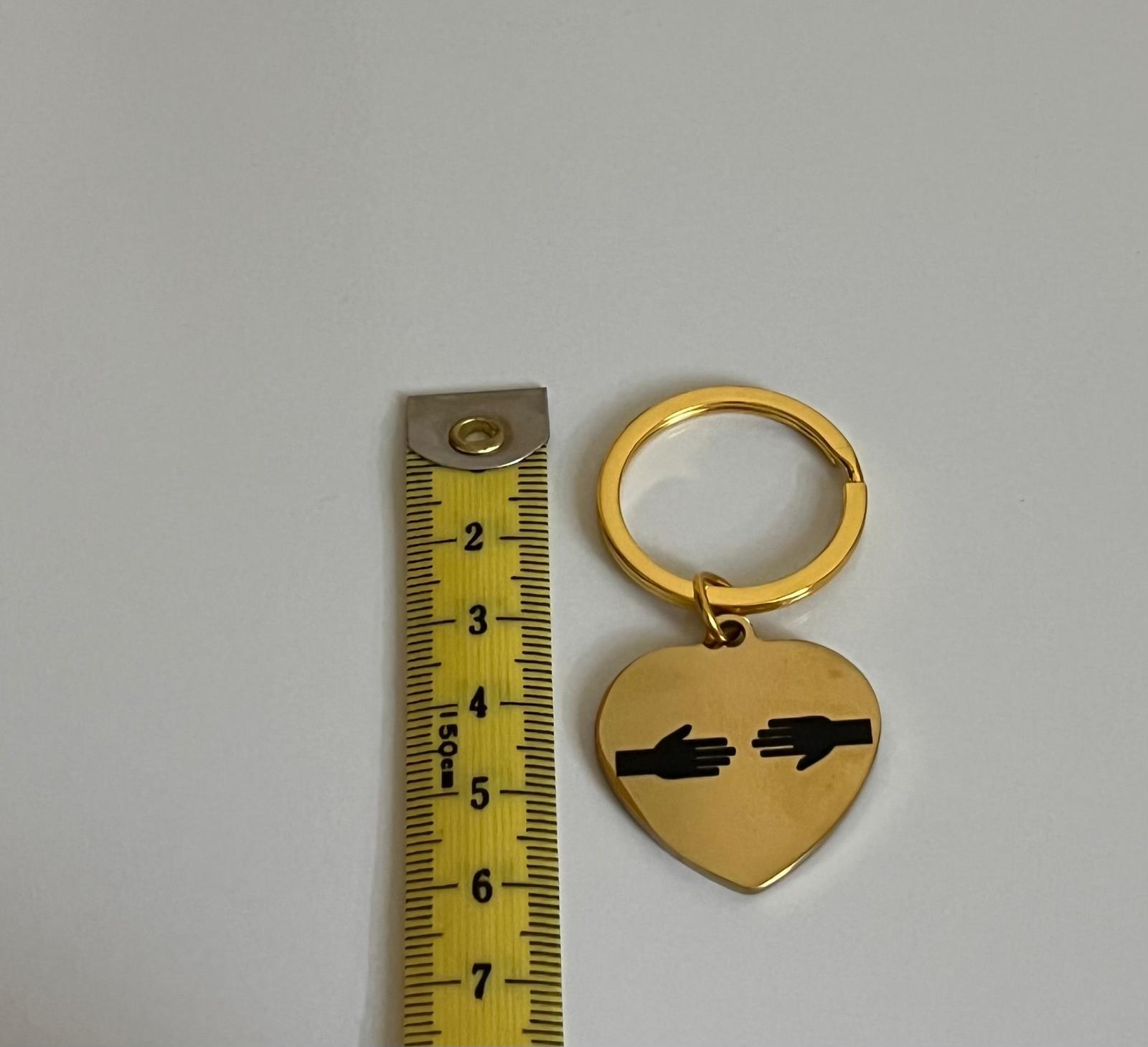 Schlüsselanhänger Schützende Hände Gold